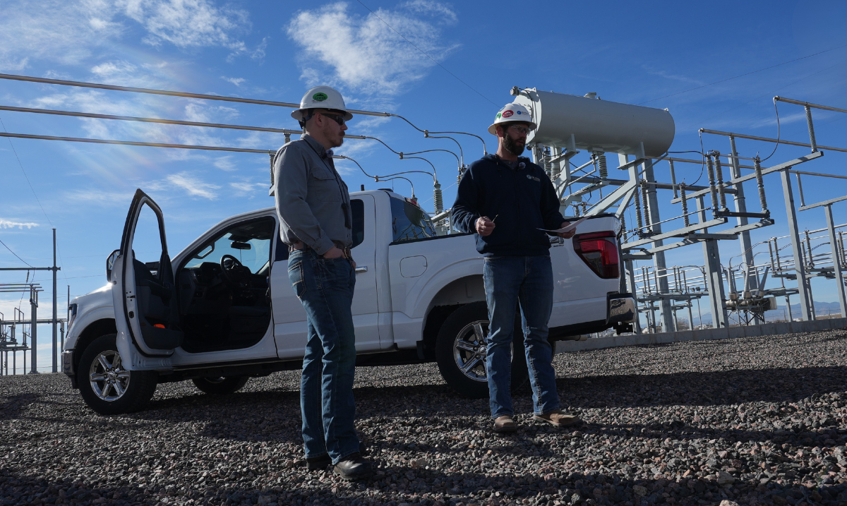 Nick Franklin and Jason Mckibben standing by truck
