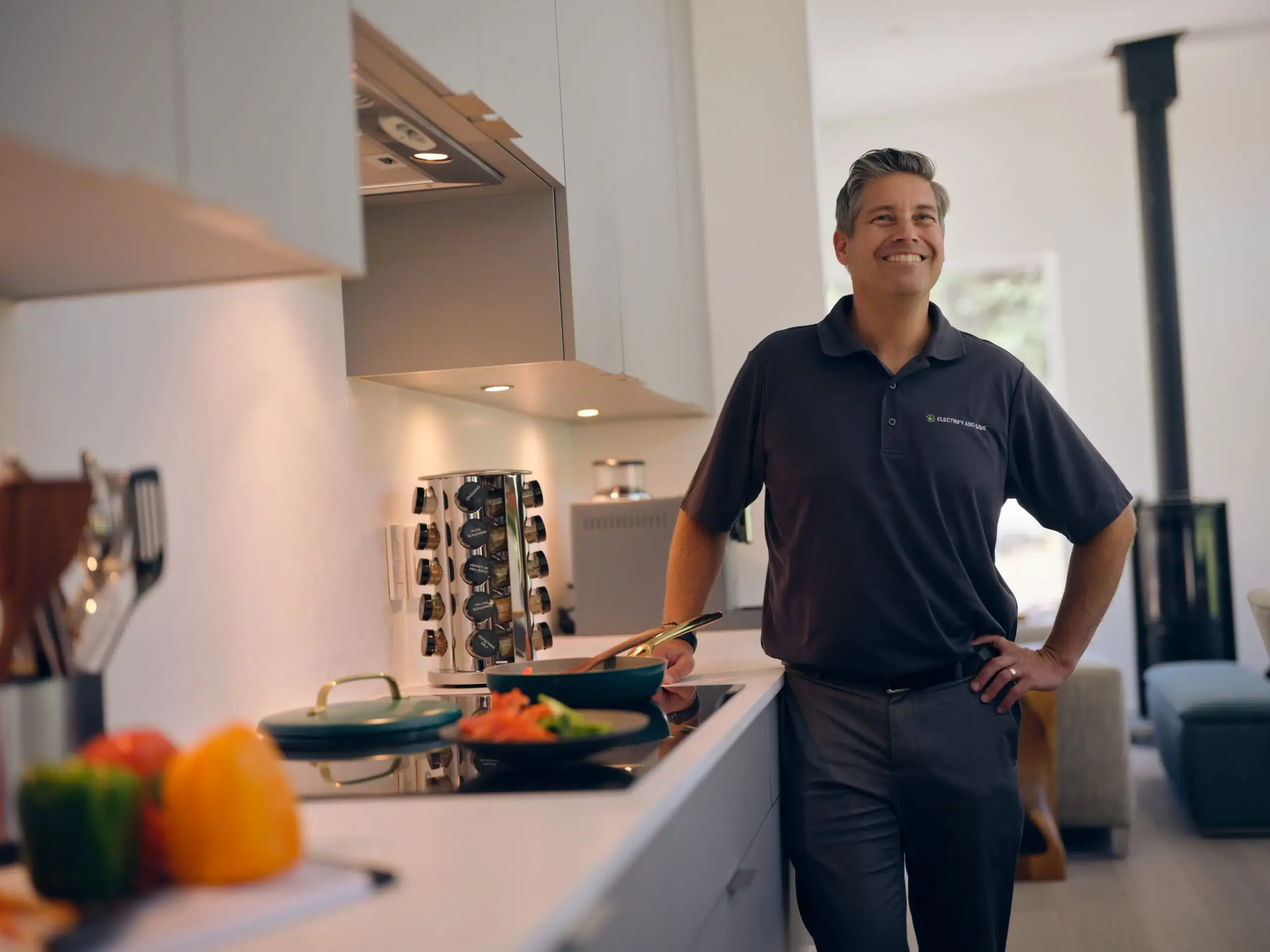 Pete Rusin standing in the home's kitchen